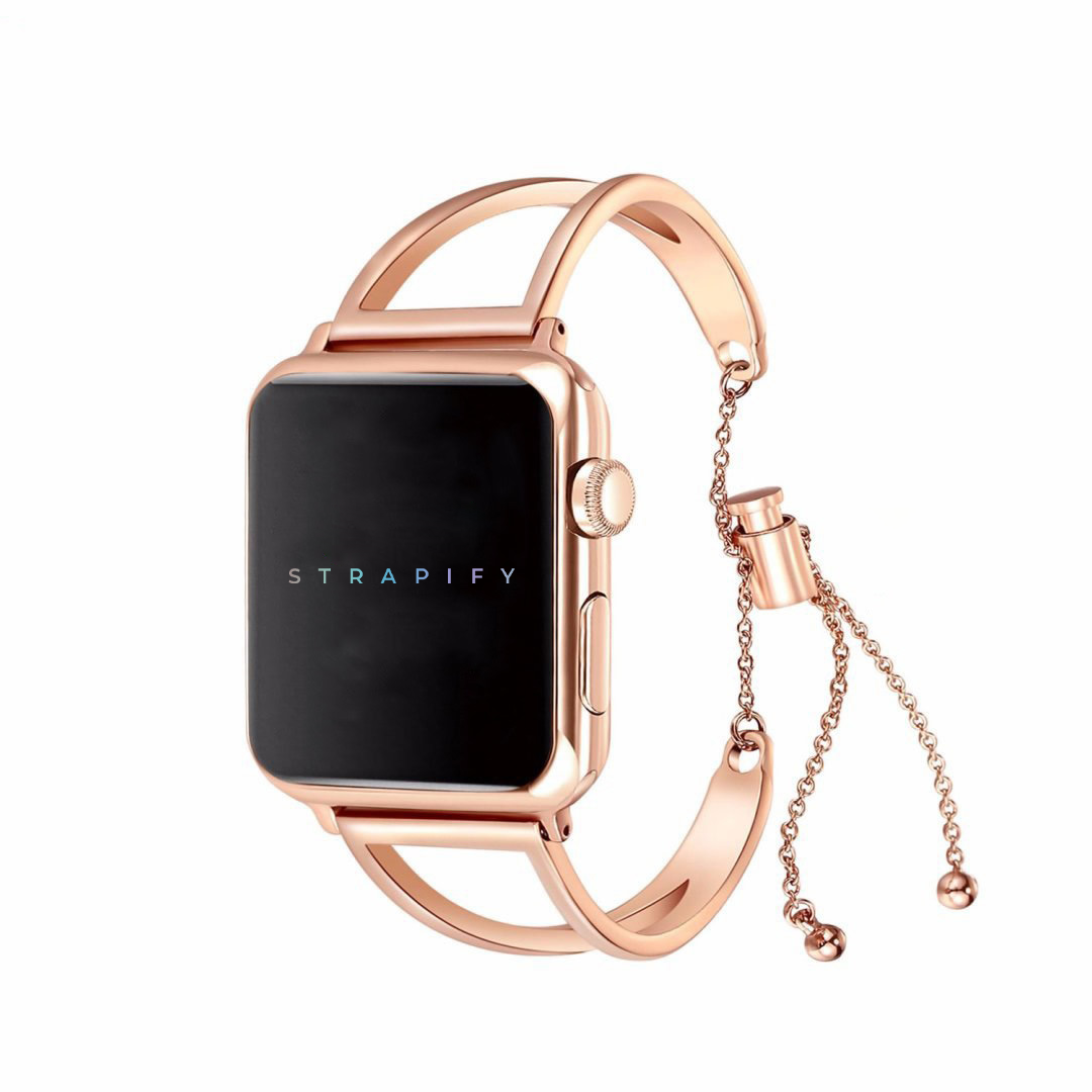 Rose gold stainless steel Apple Watch bracelet with chain charm details and matching nude band strap
