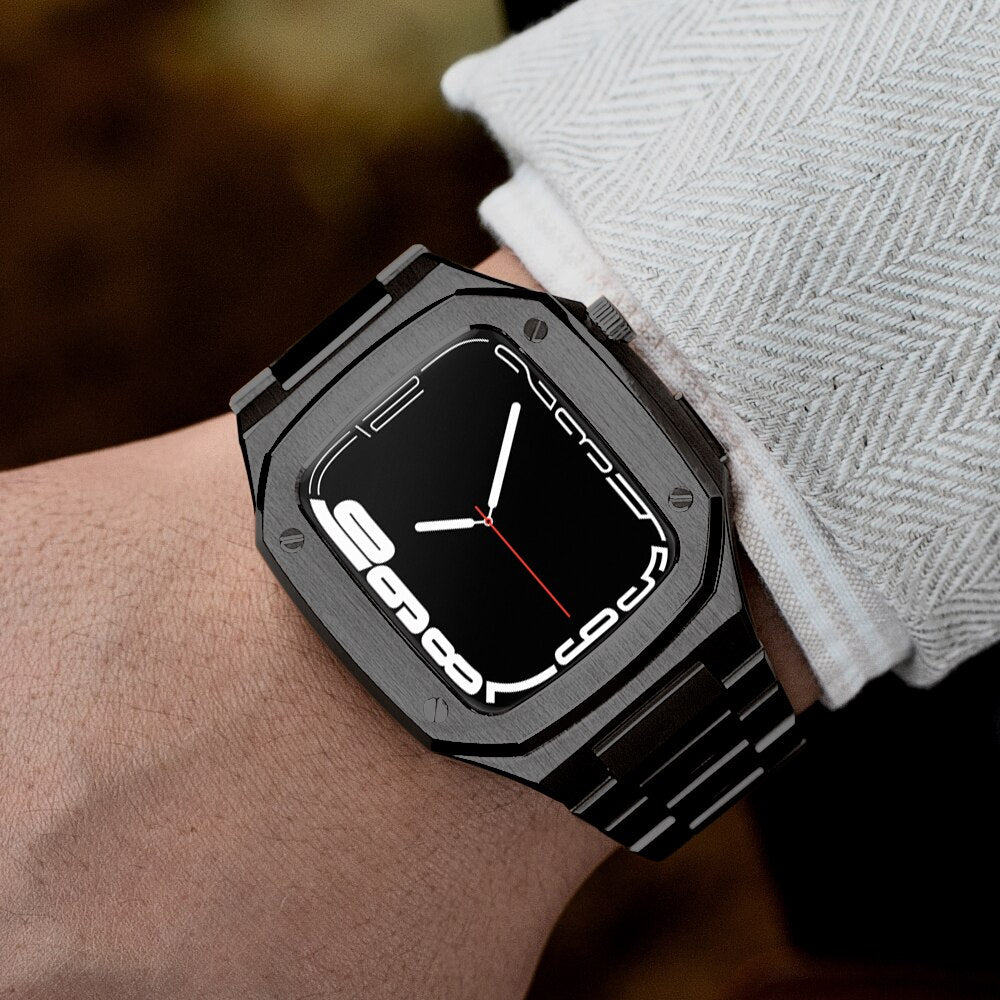 Black stainless steel luxury watch case and band with square dial and minimalist white hands on wrist