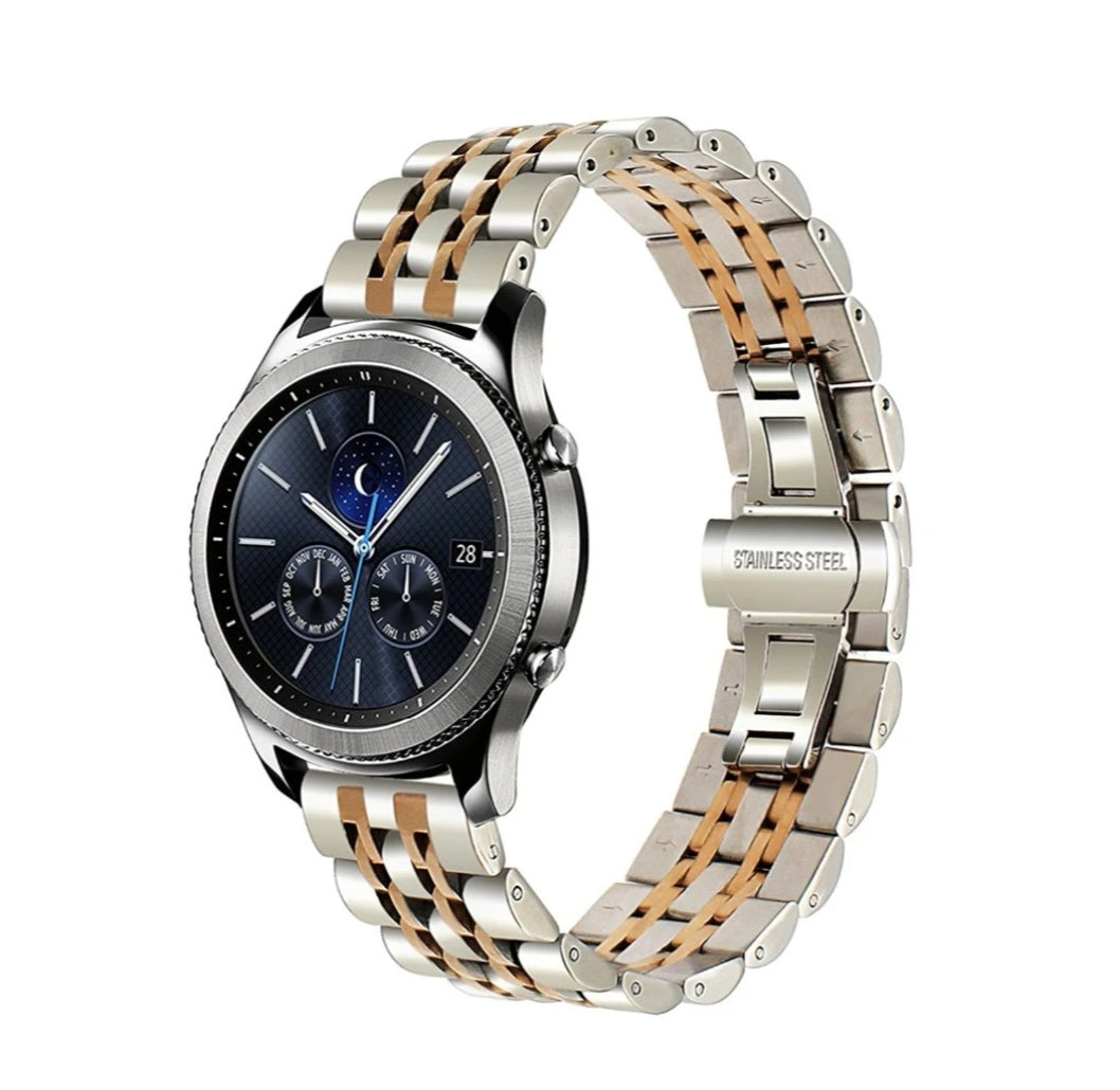 Two-tone stainless steel watch band with rose gold accents and deployment clasp for smartwatch