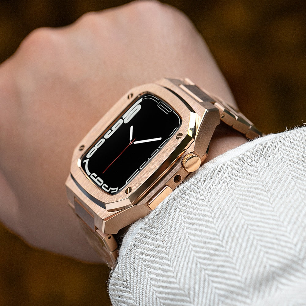 Rose gold stainless steel Apple Watch with matching metal bracelet band on wrist, luxury smartwatch accessory