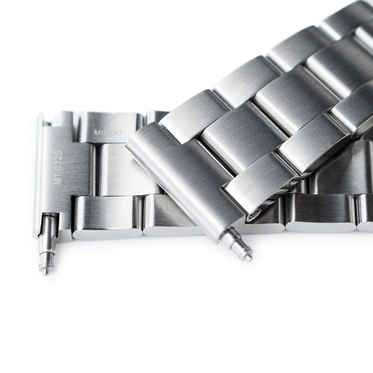 Stainless steel watch bracelet with polished links and secure V-clasp deployment buckle