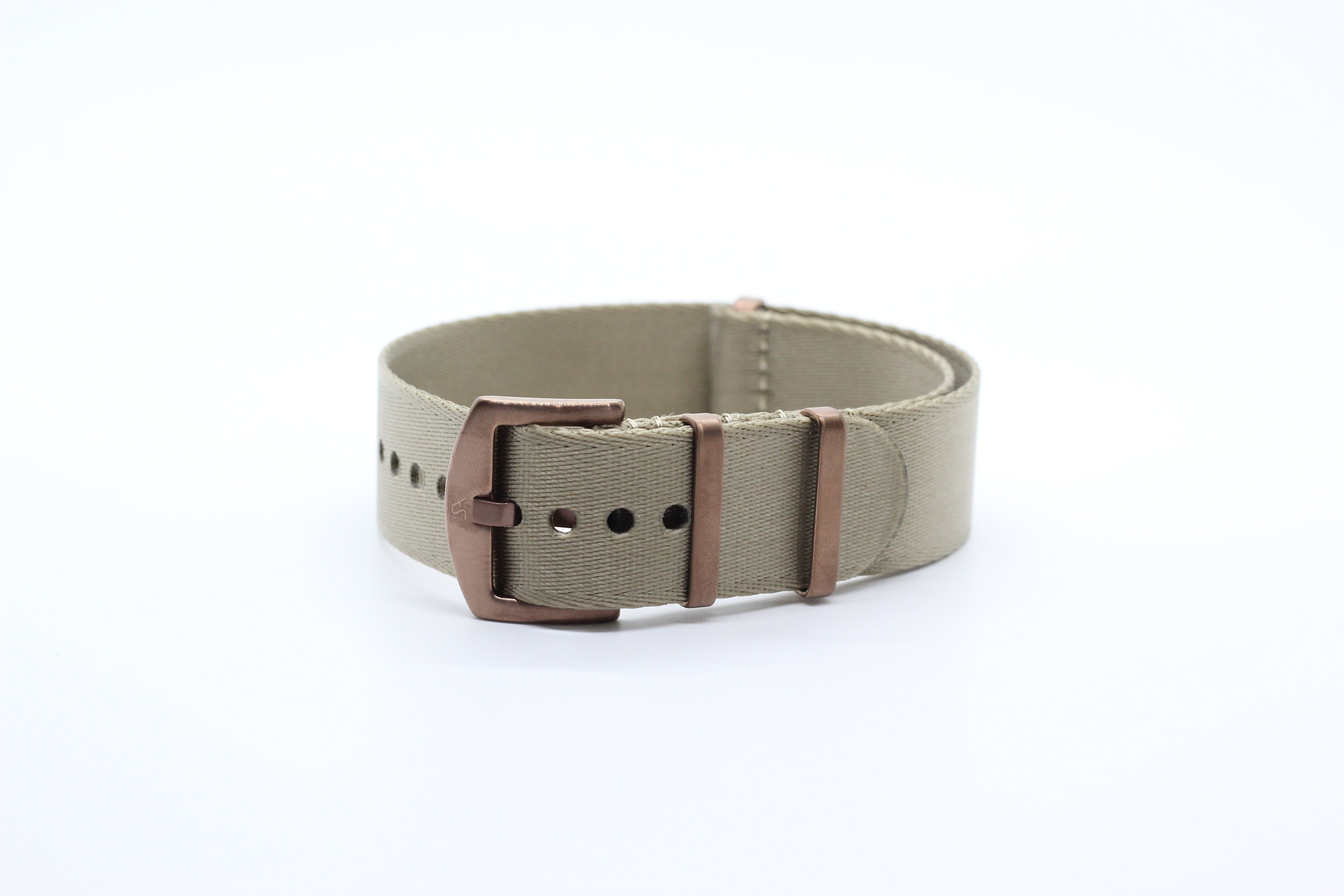 Beige canvas belt with bronze buckle and hardware, military-style webbing strap design