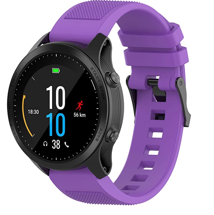 Black sports smartwatch with purple silicone QuickFit band showing fitness tracking display and heart rate monitor
