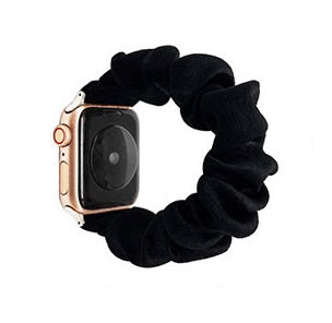 Rose gold smartwatch with black velvet scrunchie loop band