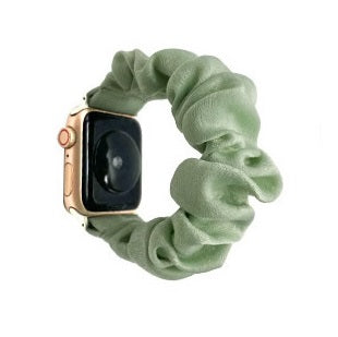 Sage green fabric scrunchie watch band with gold hardware connector for Apple Watch
