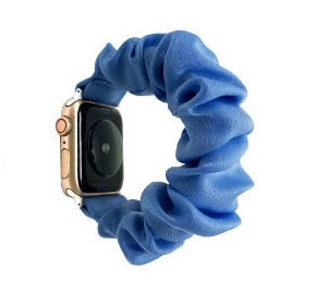 Blue scrunchie Apple Watch band with gold stainless steel case and digital crown hardware