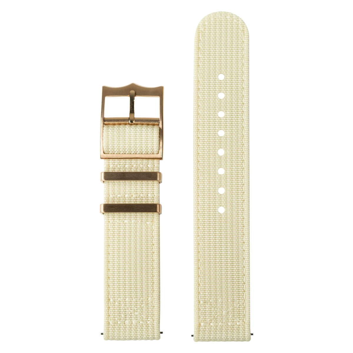 Beige canvas quick release watch strap with bronze buckle and adjustment holes