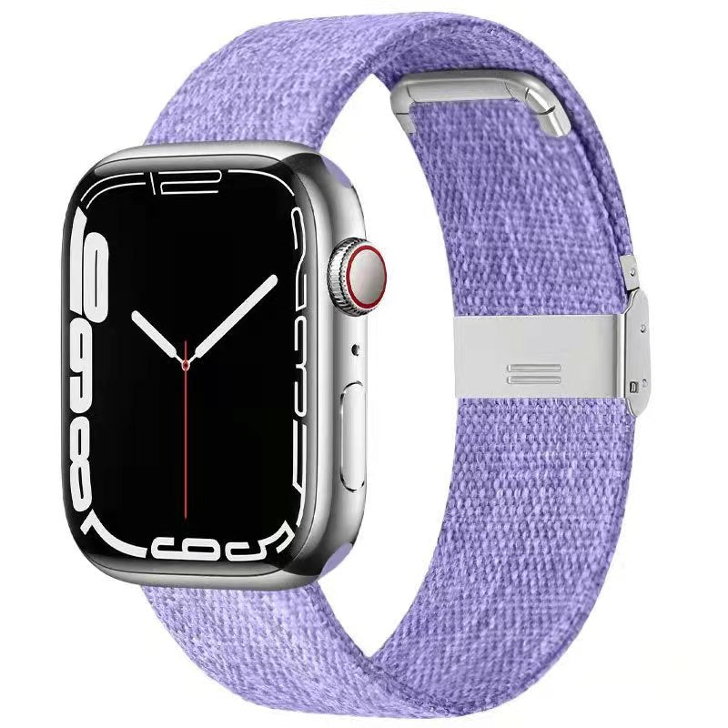 Silver stainless steel smartwatch with black display and purple woven canvas band with metal clasp closure
