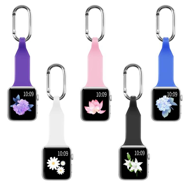 Apple Watch carabiner fobs in five colors - purple, pink, white, black, and blue - with metal clip attachments