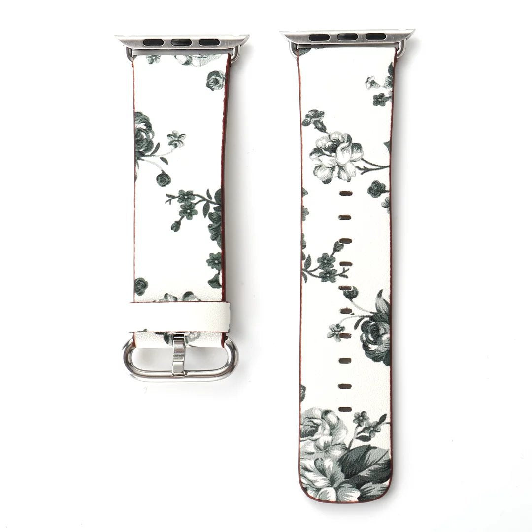 White floral leather Apple Watch band with vintage botanical flower pattern and silver connector hardware