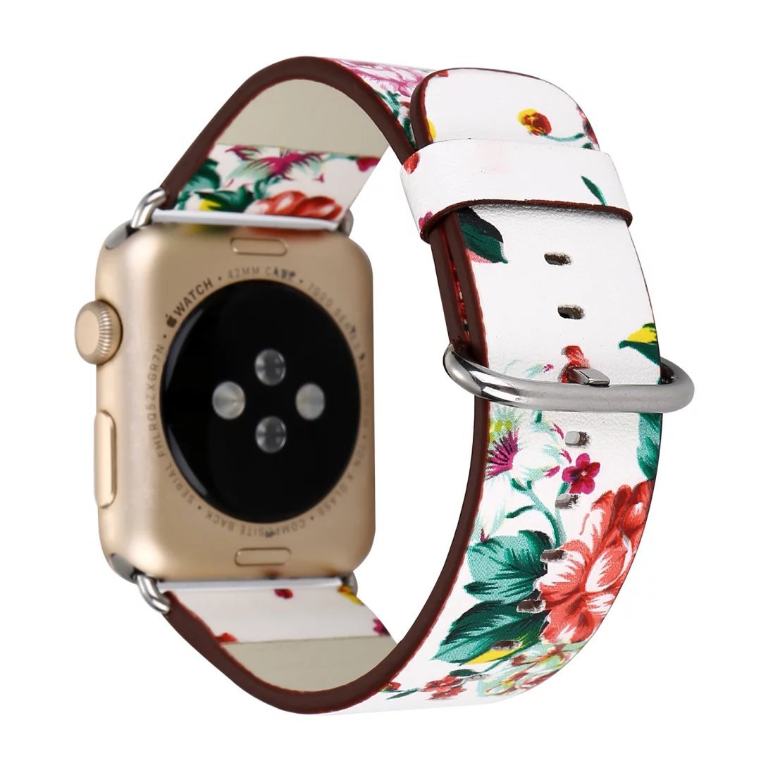 Gold smartwatch with floral printed leather band featuring red roses, pink flowers, and green leaves on white background with burgundy edges