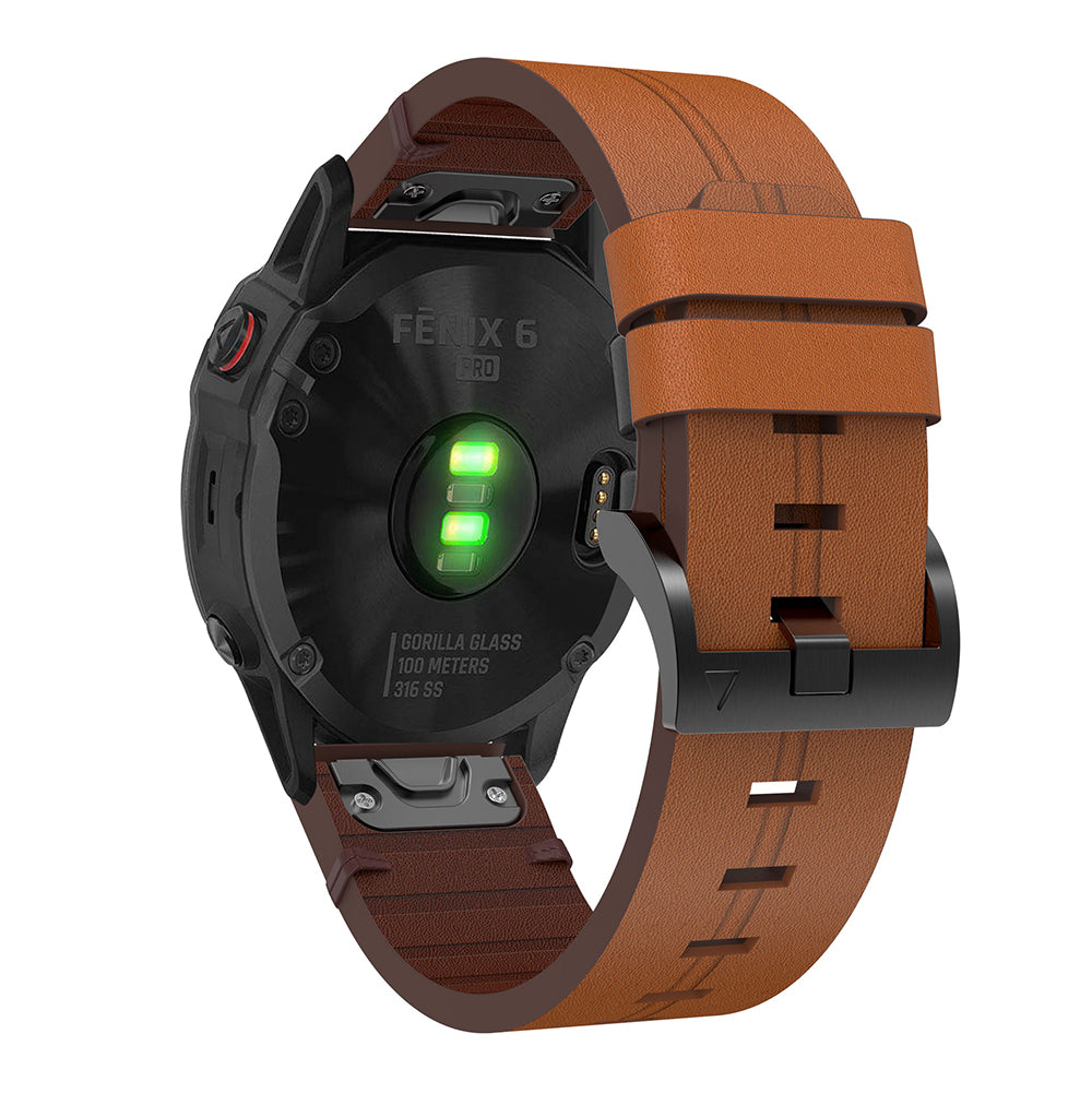 Garmin Fenix 6 Pro smartwatch with dark brown leather QuickFit band and black case showing green battery indicator