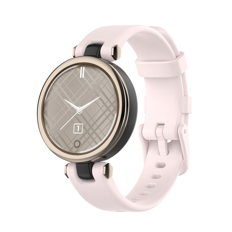 Garmin Lily smartwatch with blush pink silicone band and round metallic case featuring quilted dial face