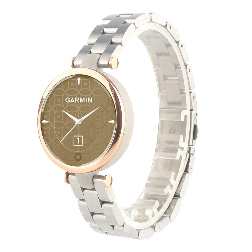 Garmin Lily smartwatch with silver stainless steel bracelet and rose gold bezel on white background