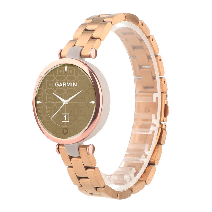 Garmin Lily rose gold smartwatch with steel bracelet, olive dial and date window on white background