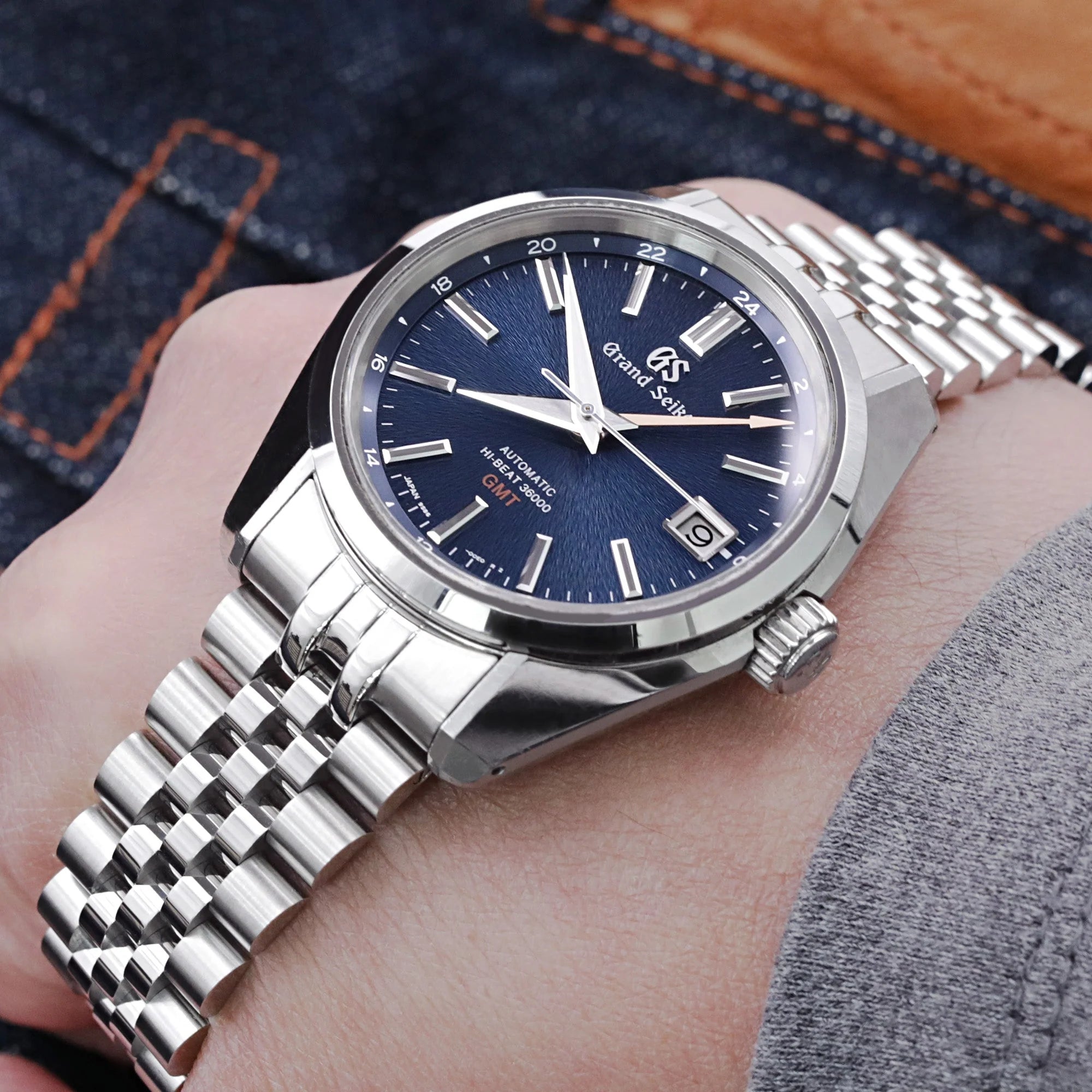 STRAPCODE Super-J Louis 19mm stainless steel bracelet on Grand Seiko automatic watch with blue dial and date window