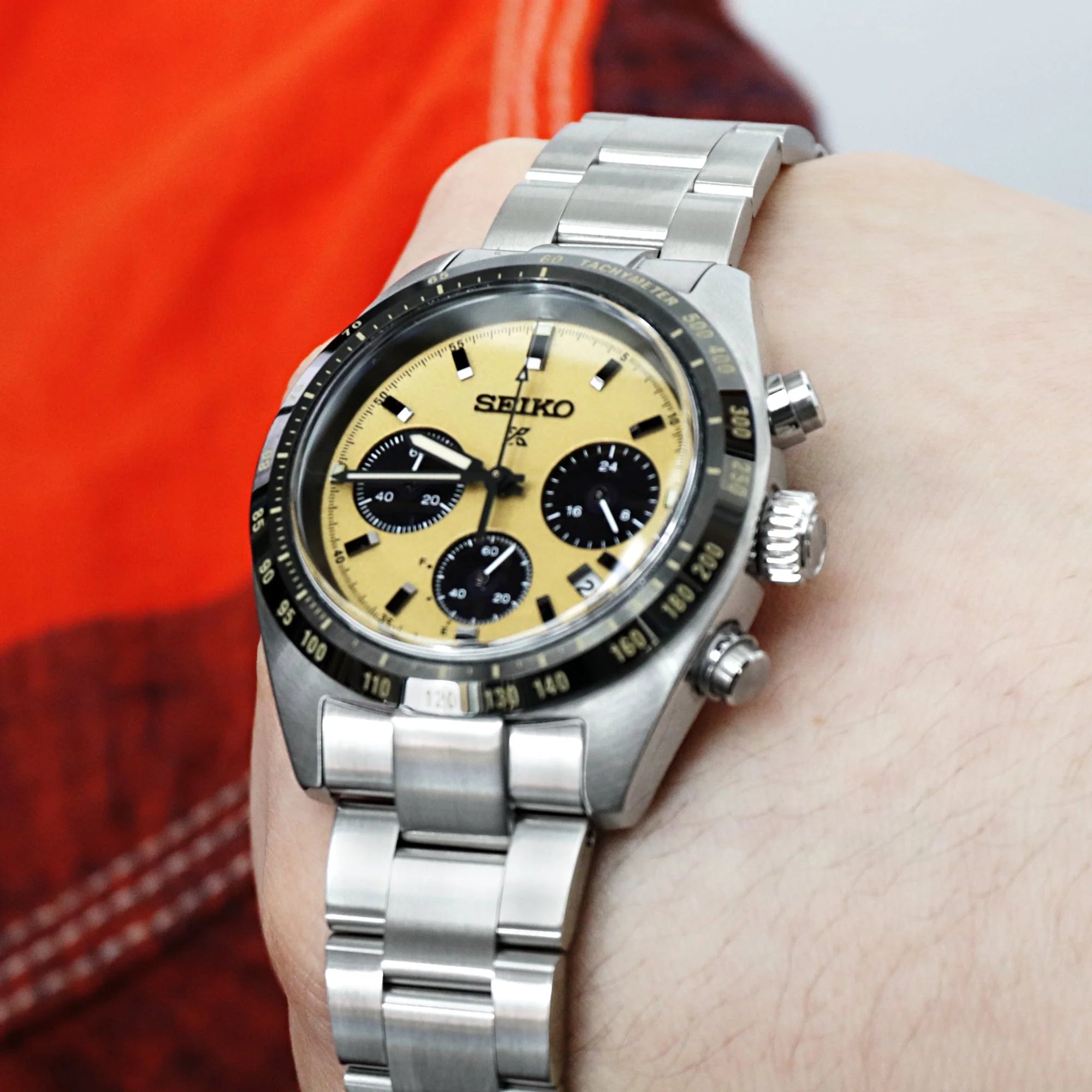 Seiko Speedtimer chronograph with cream dial and three black subdials on stainless steel Super-O Boyer bracelet