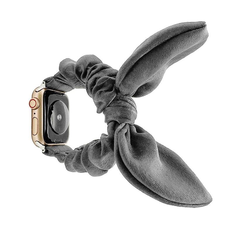 Gray fabric ribbon loop scrunchie Apple Watch band with gold case and red digital crown detail