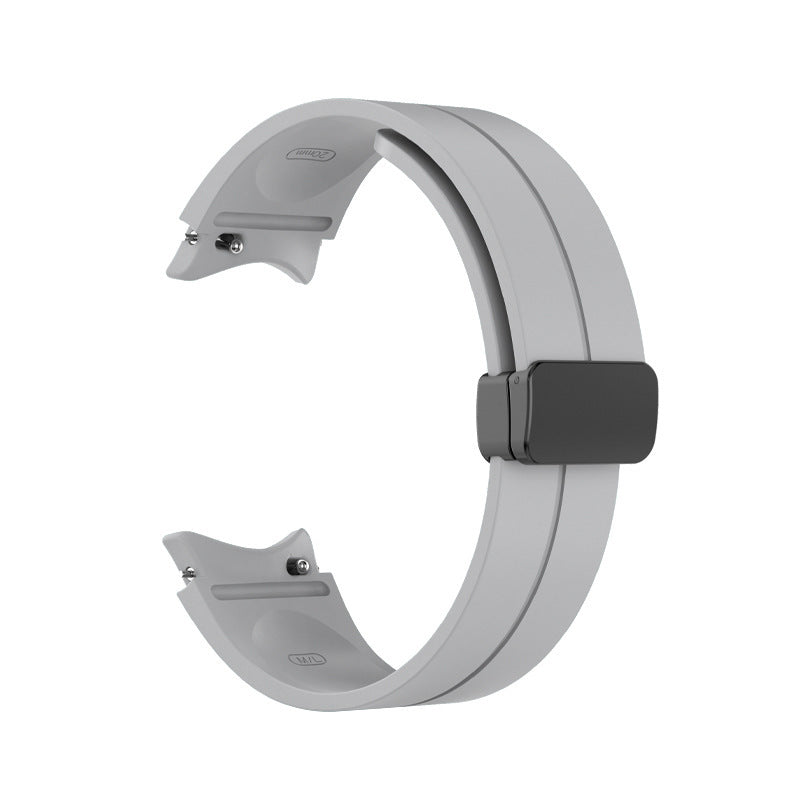 Gray silicone smartwatch band with magnetic buckle closure and quick-release pins, compatible with Galaxy Watch 4-7 and Vivomove HR