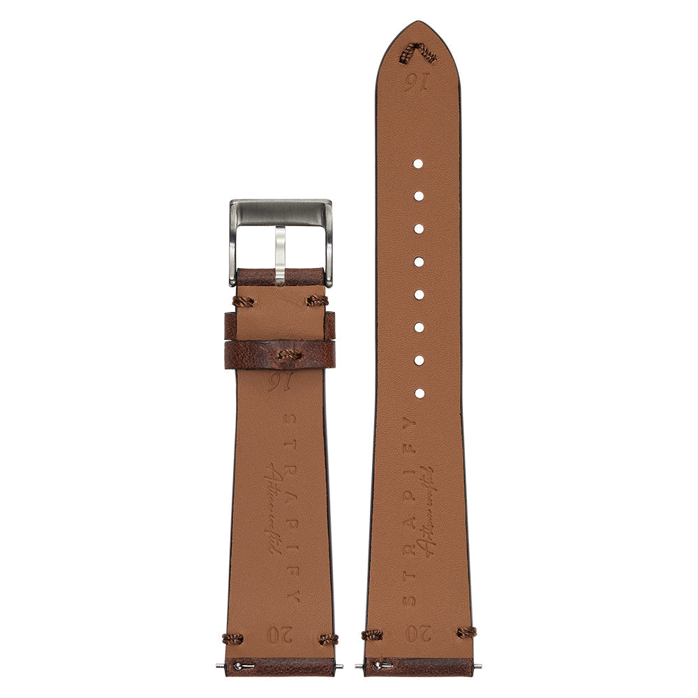 Tan and brown vintage crazy horse leather quick release watch band with silver buckle and white stitching detail