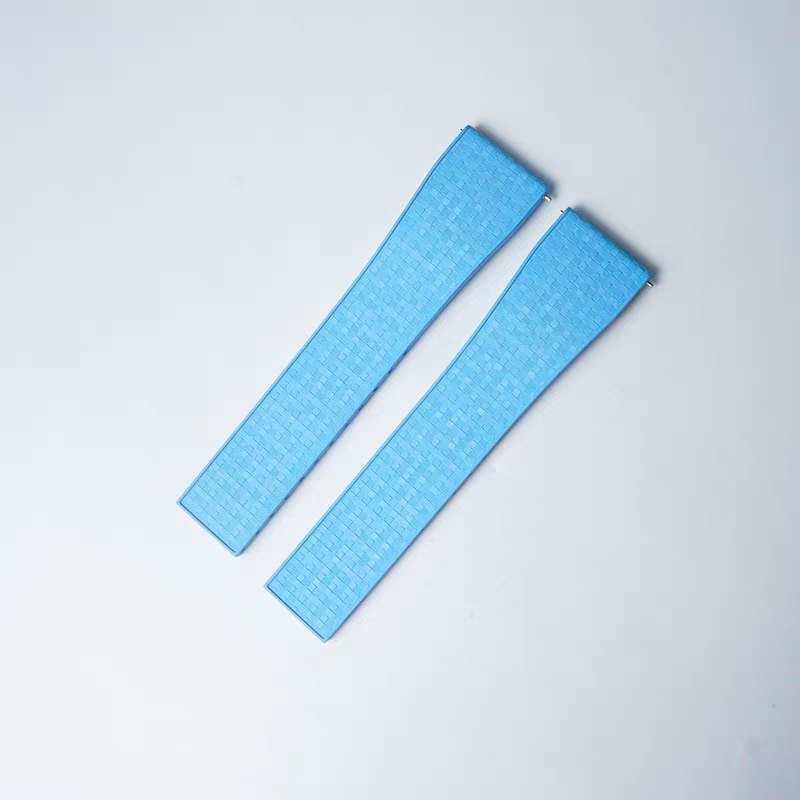 Pair of blue FKM rubber watch straps with quick release 16mm pins and leaf-spring deployant clasp
