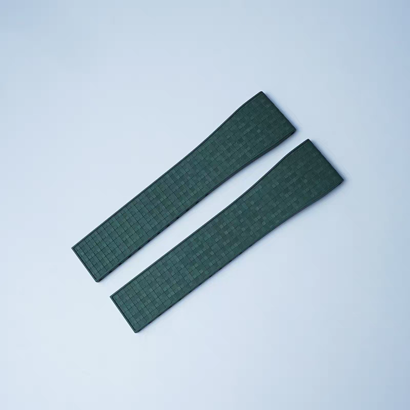 Pair of dark green textured rubber watch straps with quick release 16mm pins and leaf-spring deployant clasp