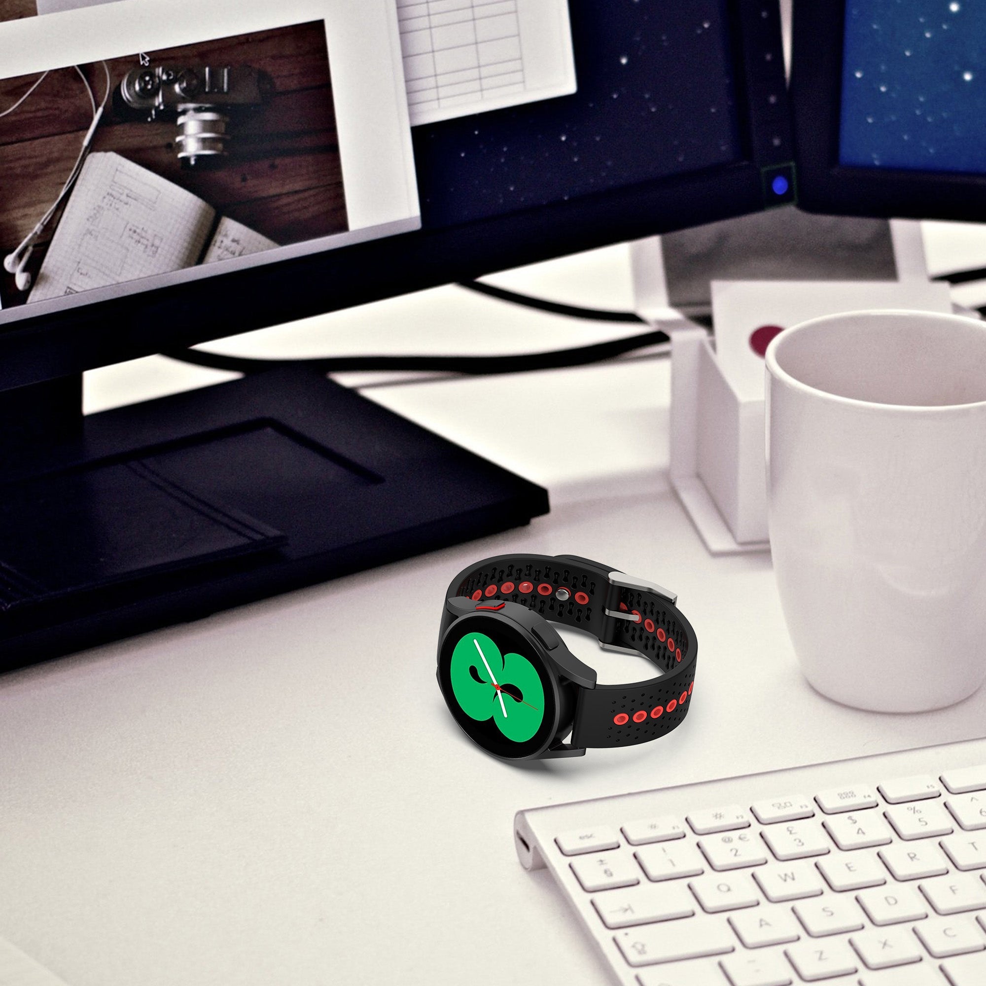 Black silicone sports smartwatch with green dial and red accents on white desk workspace