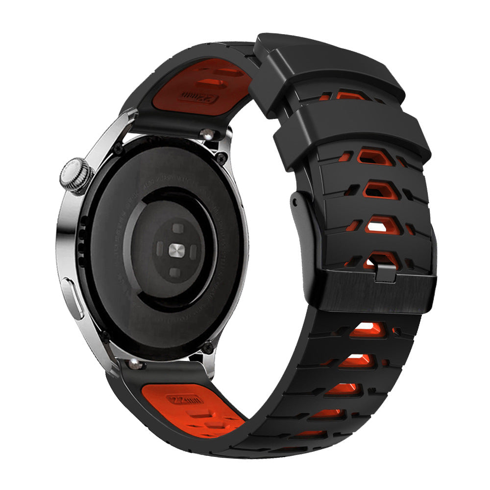Black and red silicone smartwatch band with quick release mechanism and ventilation holes, shown attached to sport watch