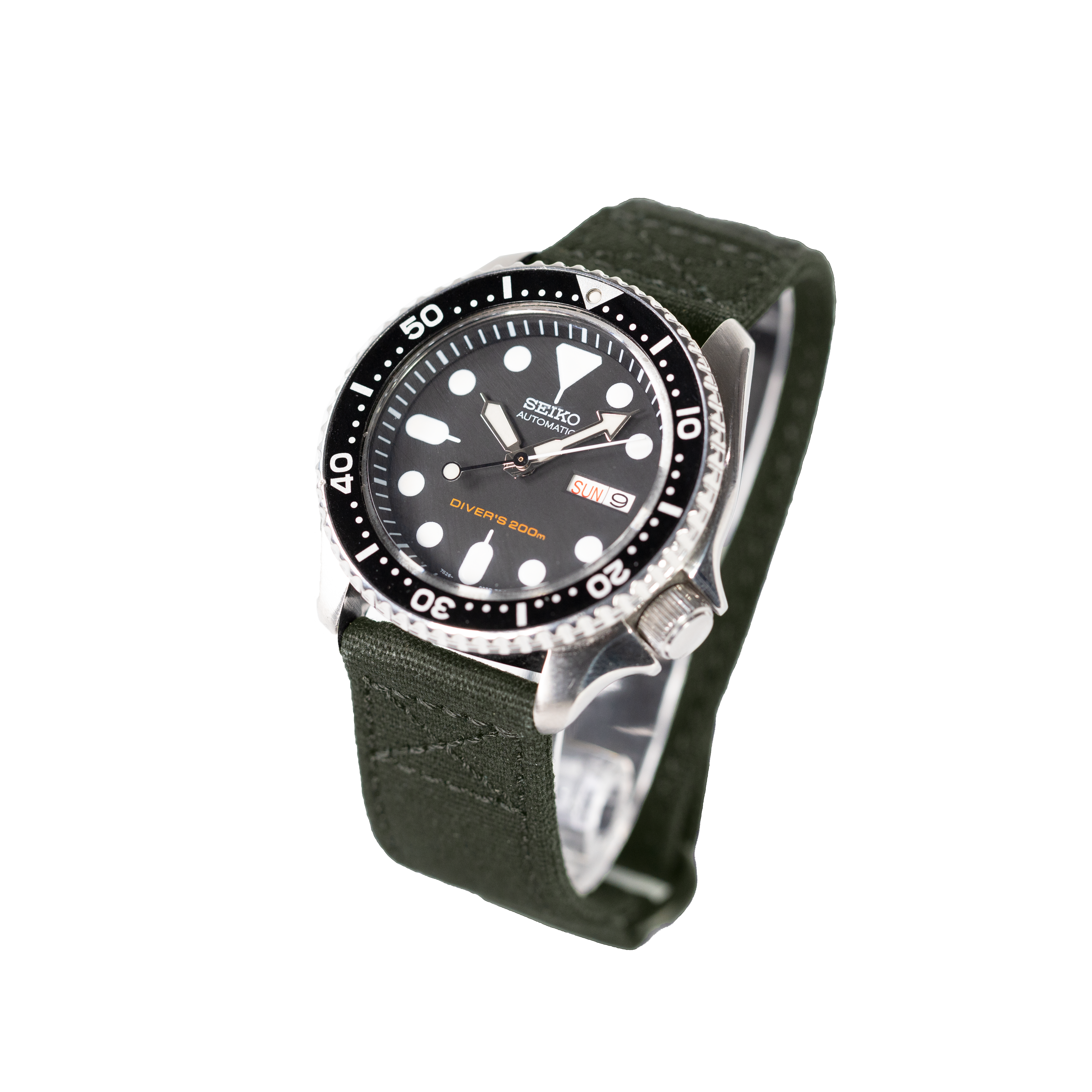 Seiko automatic dive watch with black dial, white markers, 200m water resistance, stainless steel case and army green fabric strap