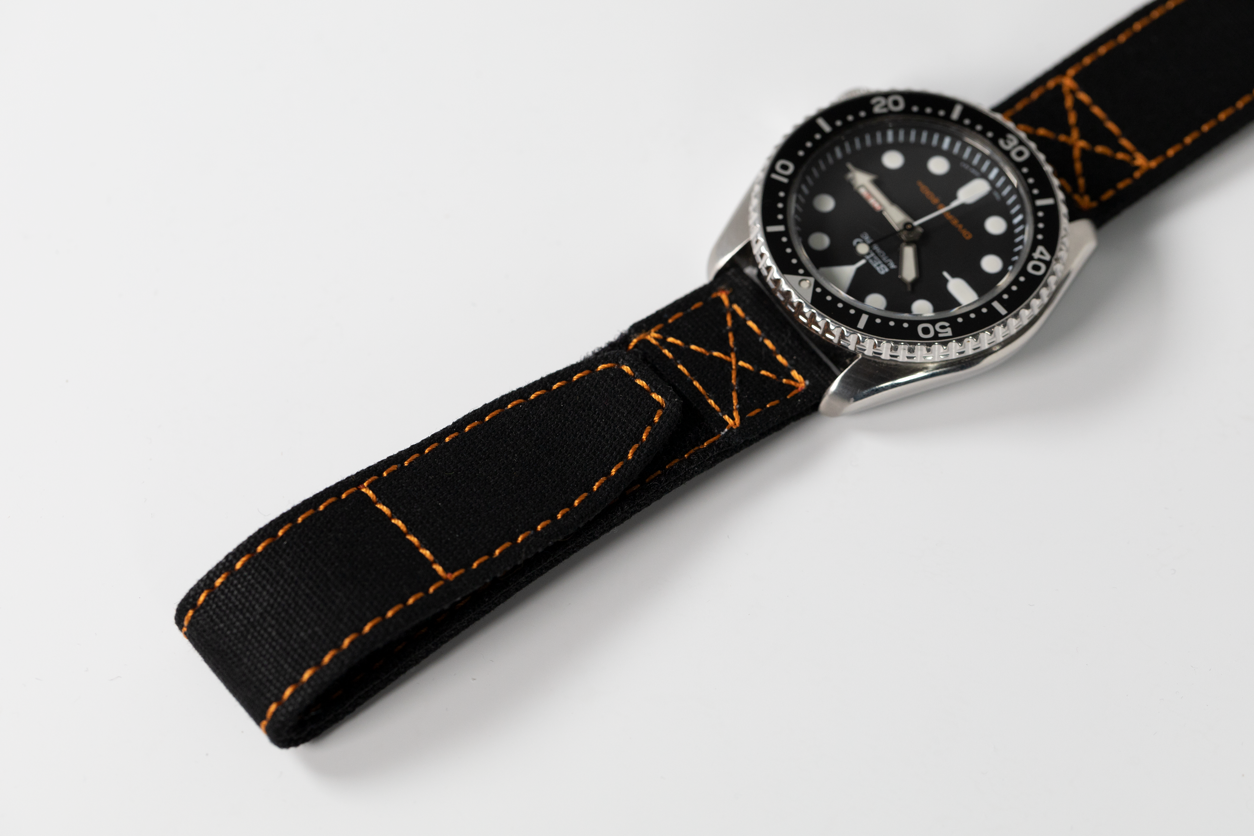 Black and orange quick release military Velcro watch strap with dial face and stainless steel case