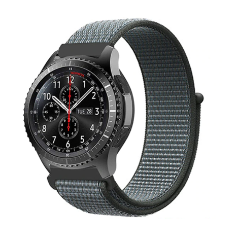 Black sports smartwatch with gray velcro loop band, chronograph dial and date display