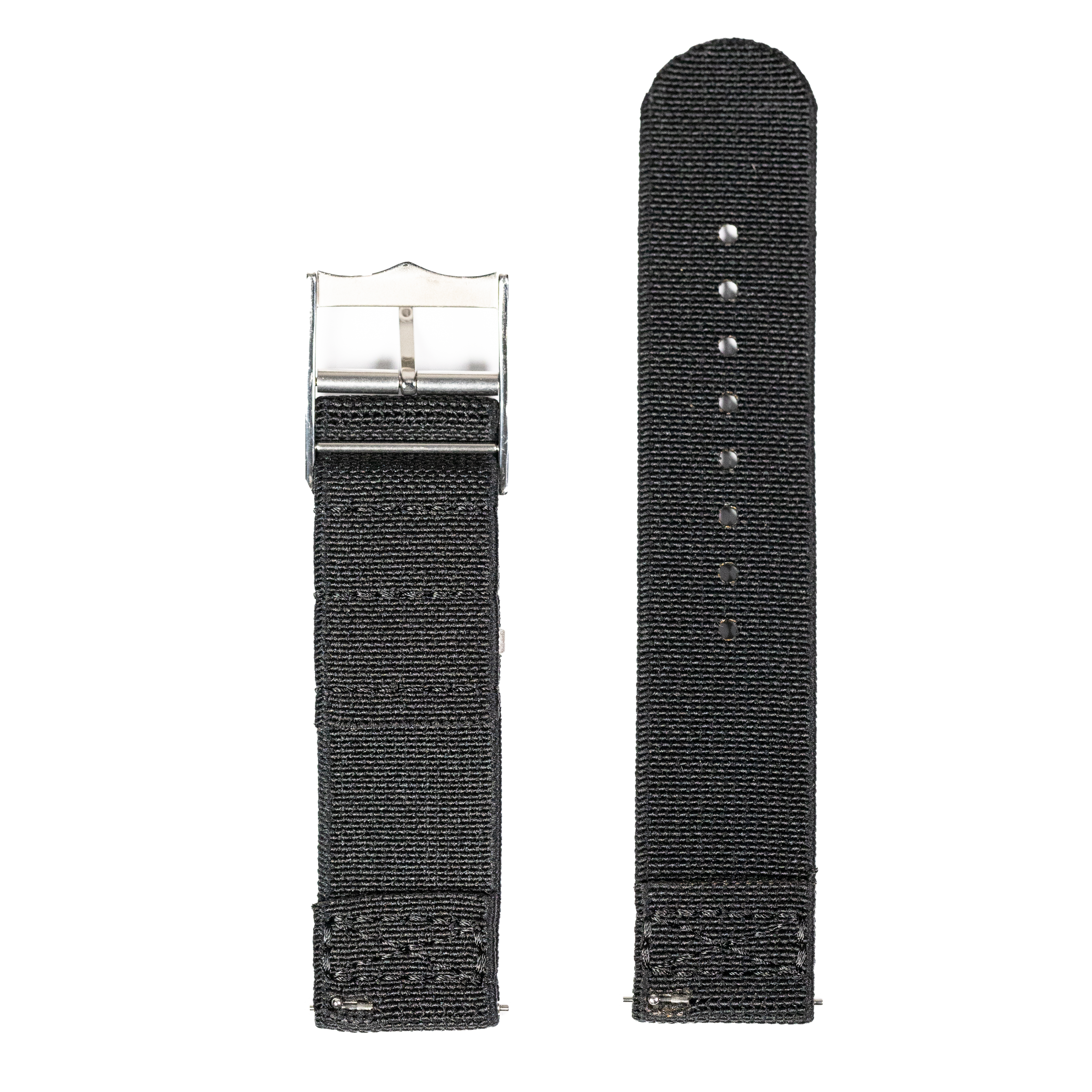 Black fabric quick release watch strap with metal buckle and adjustment holes, shown folded and flat