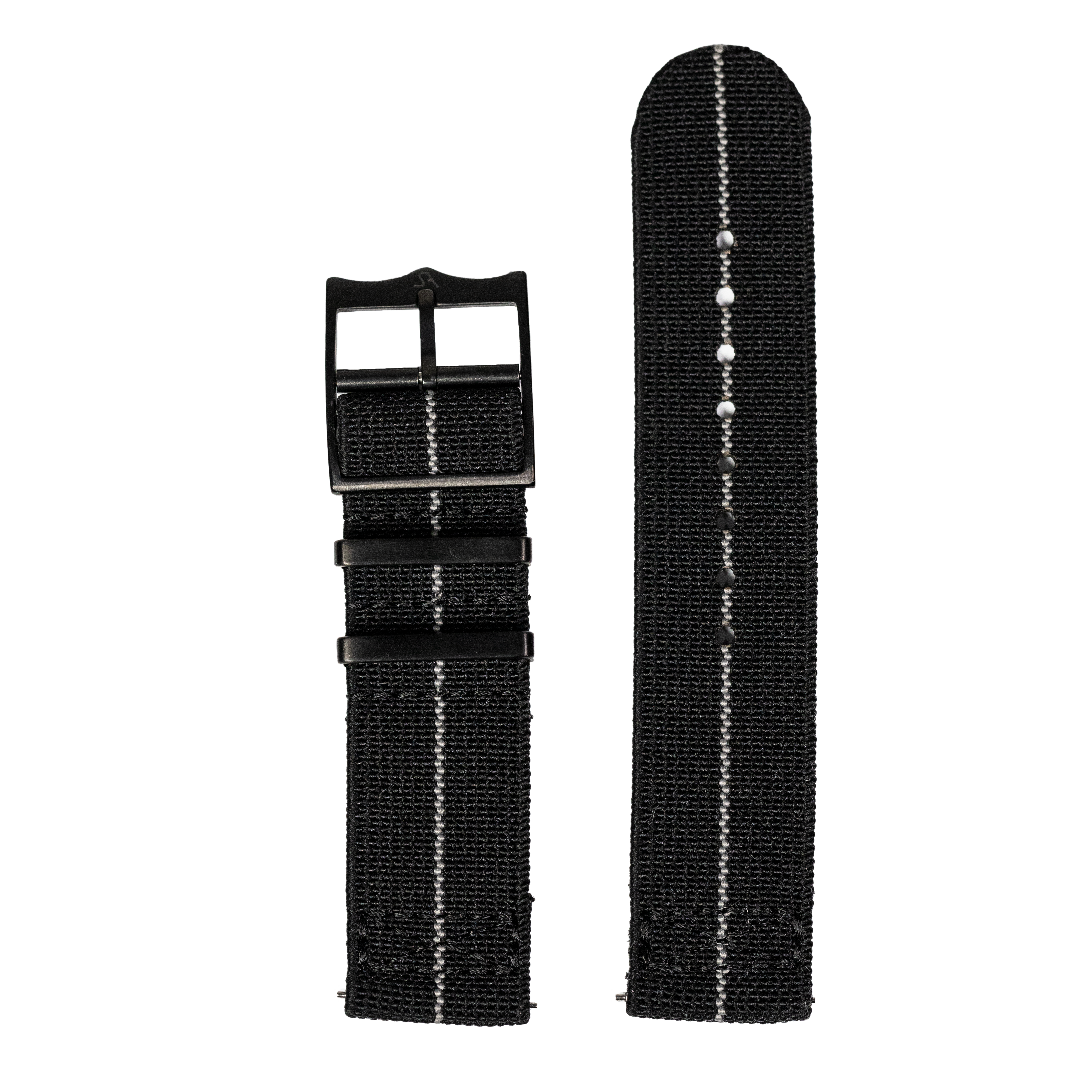 Black nylon quick-release watch strap with white center stripe and black hardware buckle, shown attached and detached