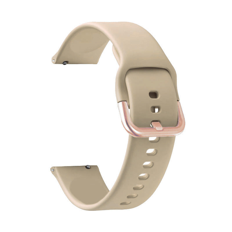 Beige silicone quick release smartwatch band with rose gold buckle and adjustment holes