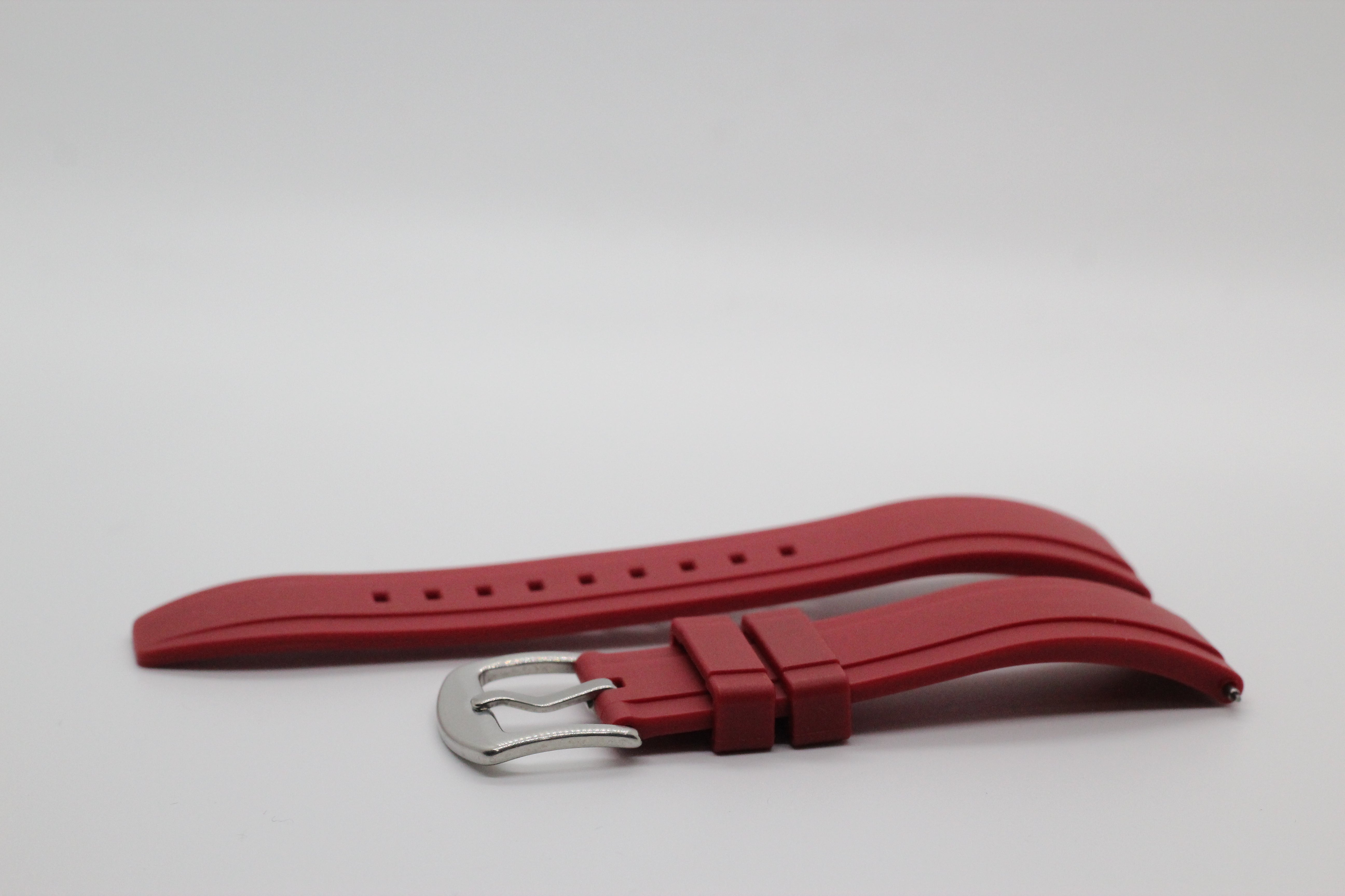Red FKM rubber quick release watch strap with silver buckle and adjustment holes
