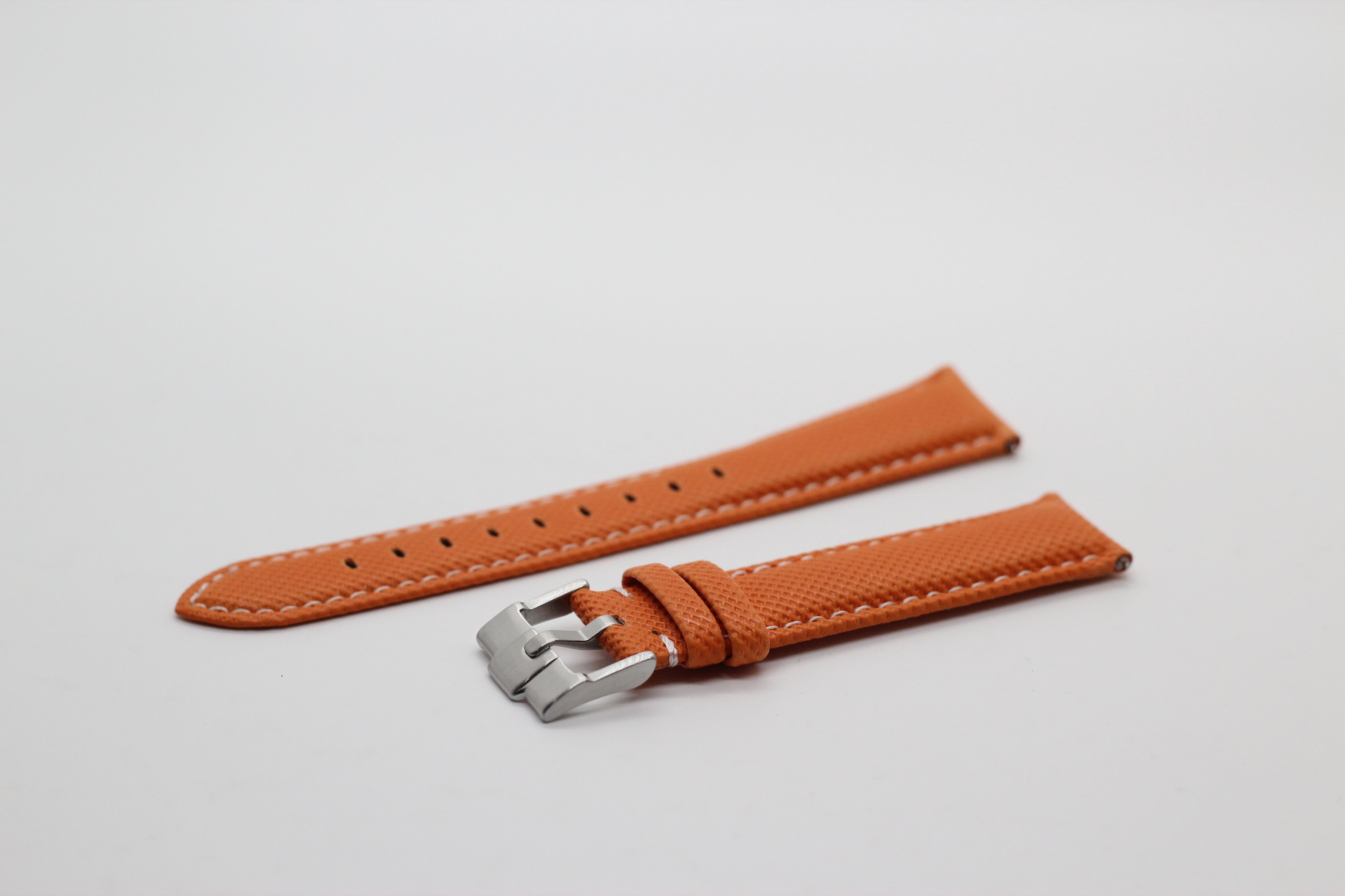 Orange sailcloth quick release watch strap with white stitching and stainless steel buckle