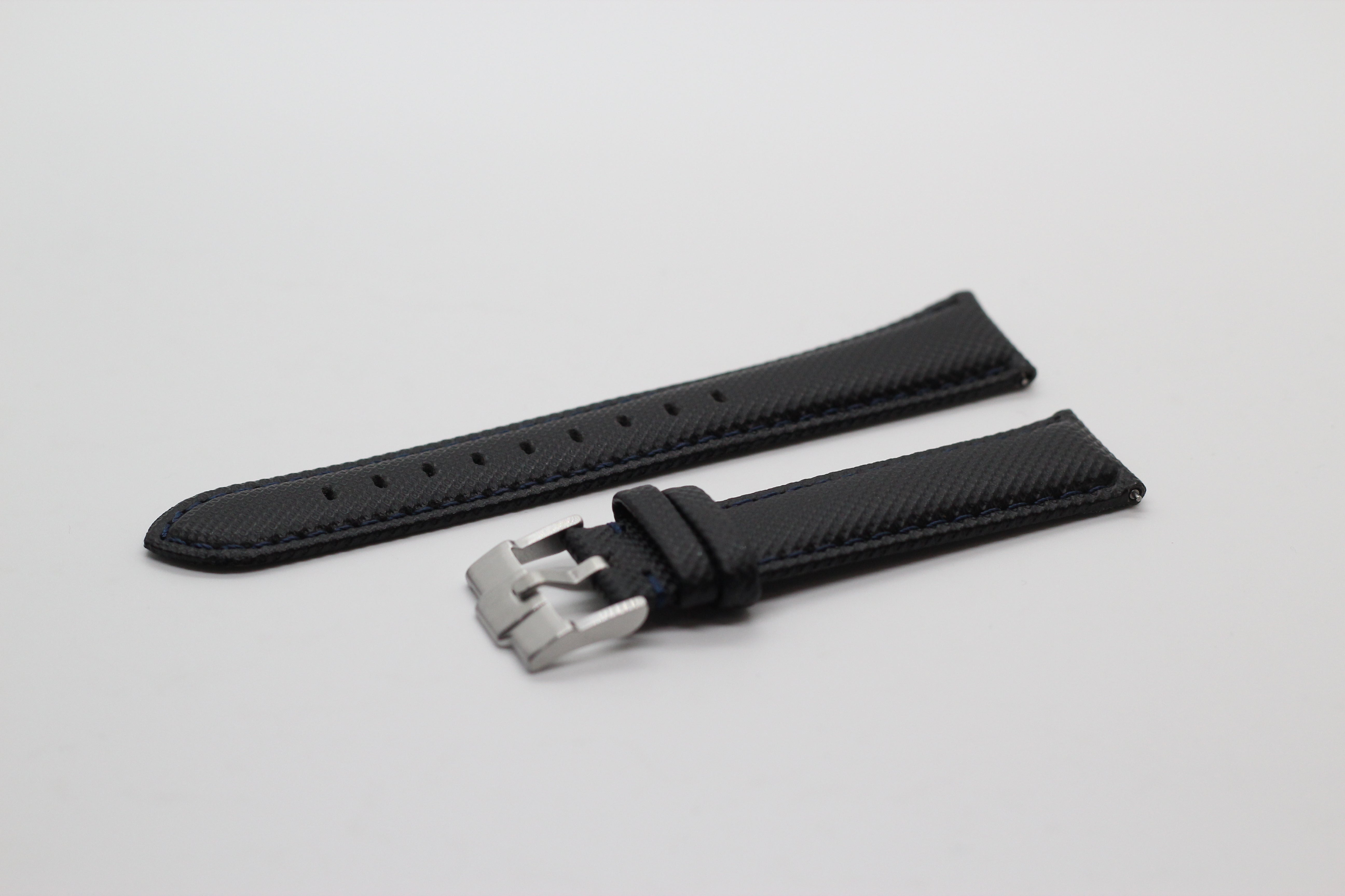 Black sailcloth quick release watch band with silver buckle and navy stitching detail