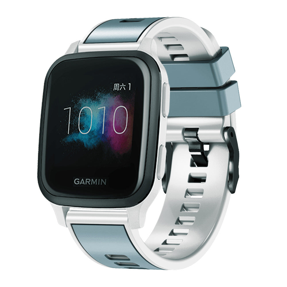 Garmin smartwatch with two-tone silicone band in blue and white featuring quick release connector and black hardware