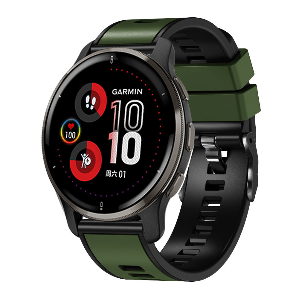 Garmin smartwatch with black case and two-tone green and black silicone quick release band, displaying fitness metrics on AMOLED screen