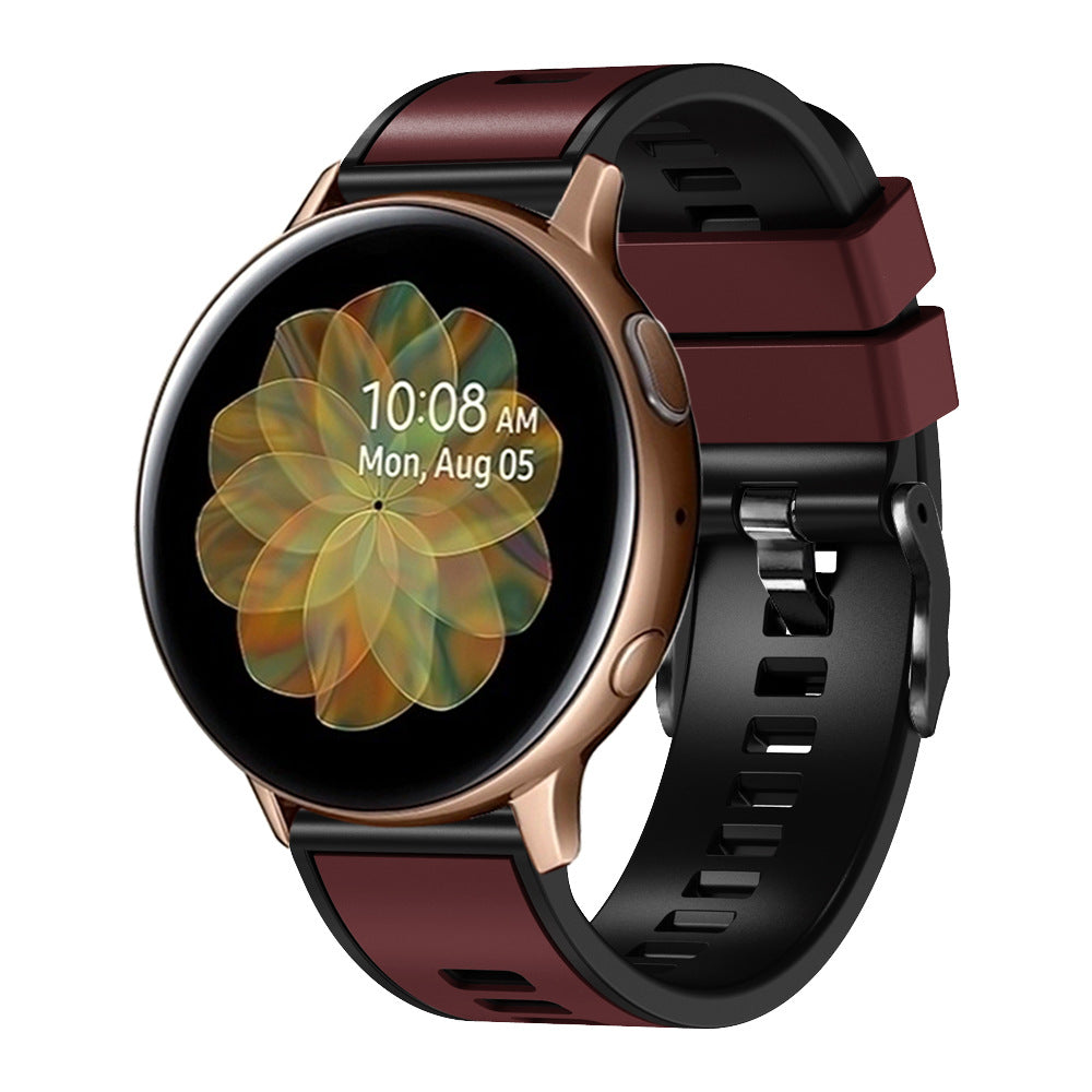 Rose gold smartwatch with burgundy and black two-tone silicone band and quick release hardware displaying time and flower wallpaper