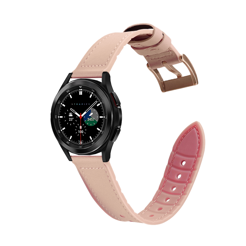 Black smartwatch with pale pink leather quick release band and rose gold buckle, displayed with interchangeable strap