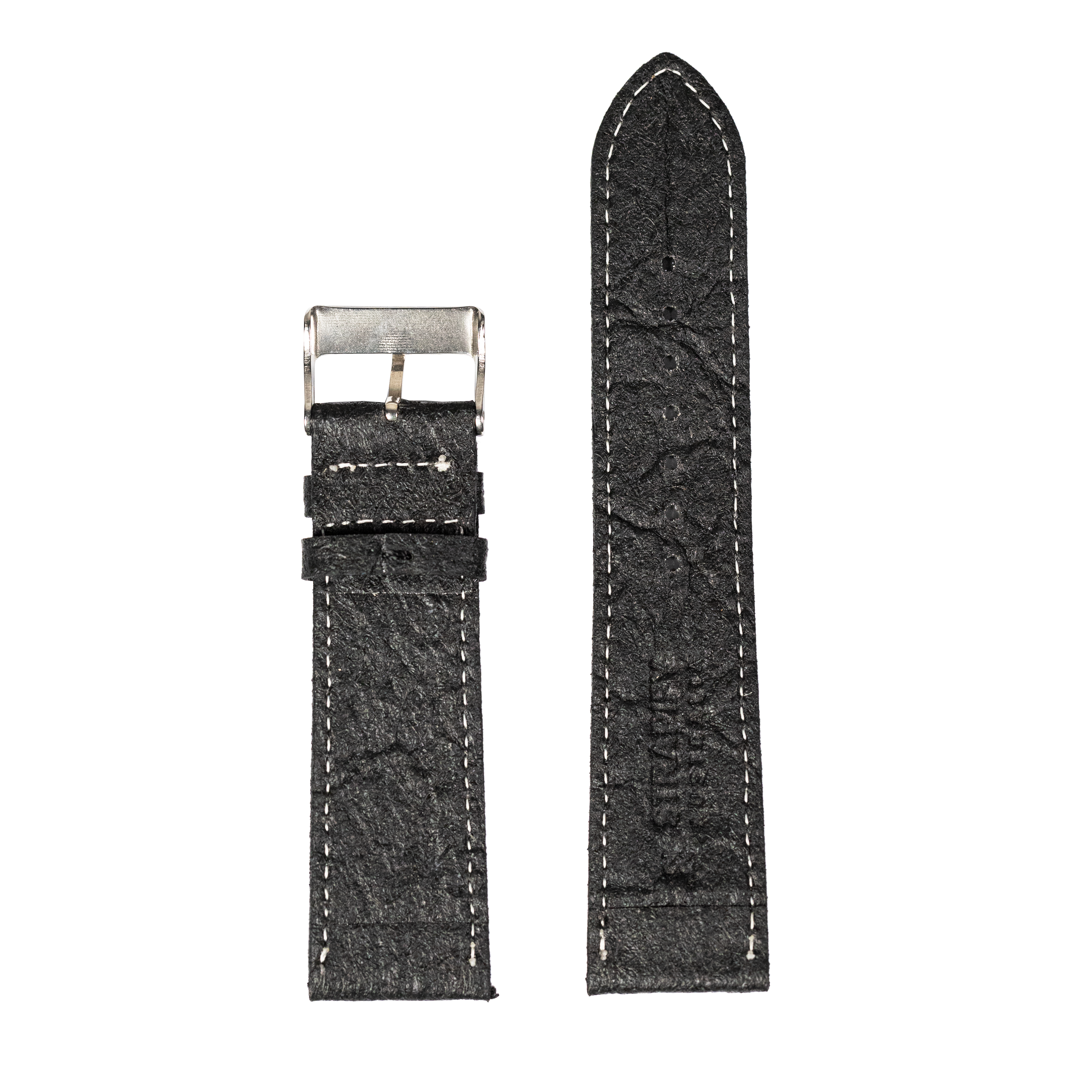 Black vegan leather quick release watch strap with white stitching and silver buckle