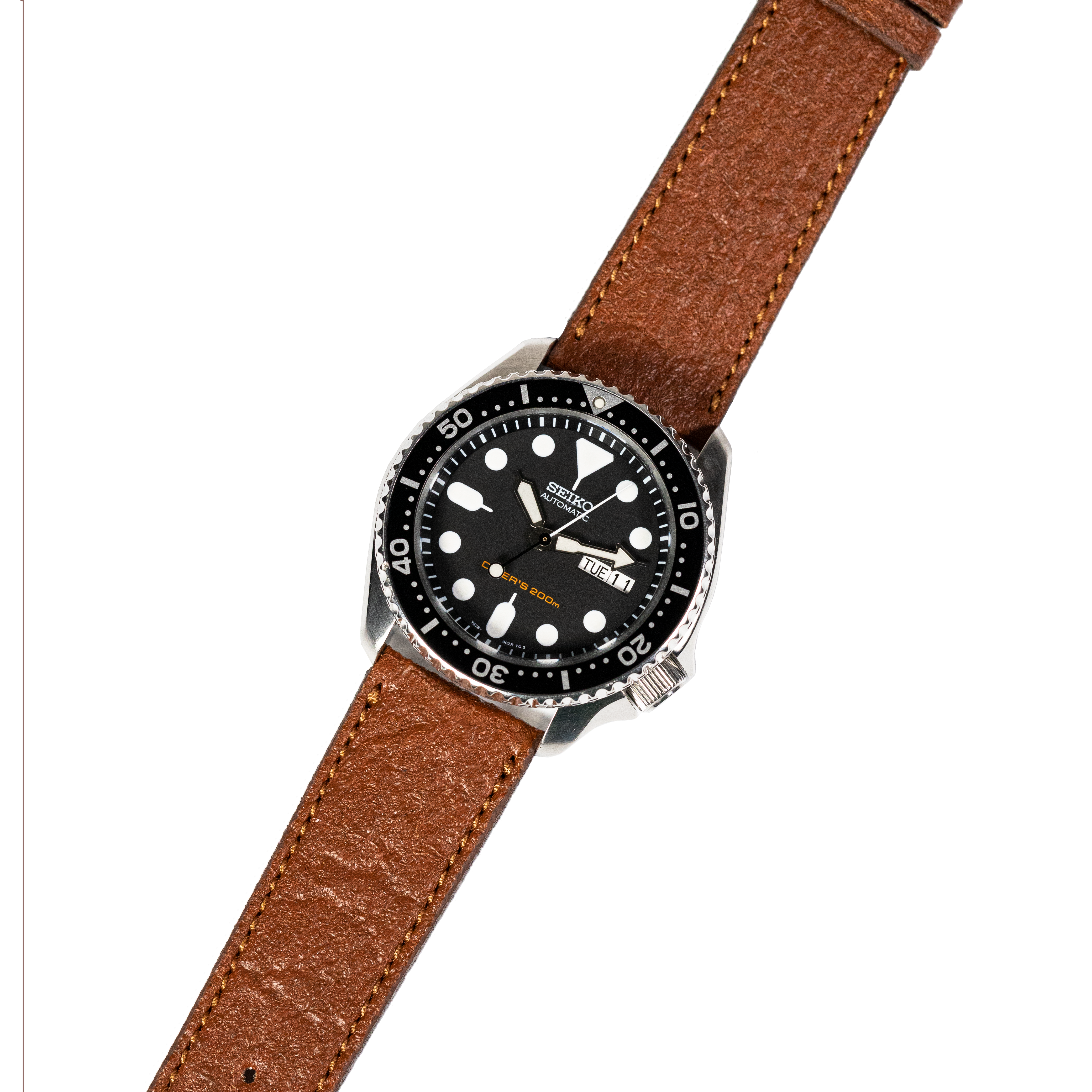Seiko automatic dive watch with black dial on brown leather quick-release strap