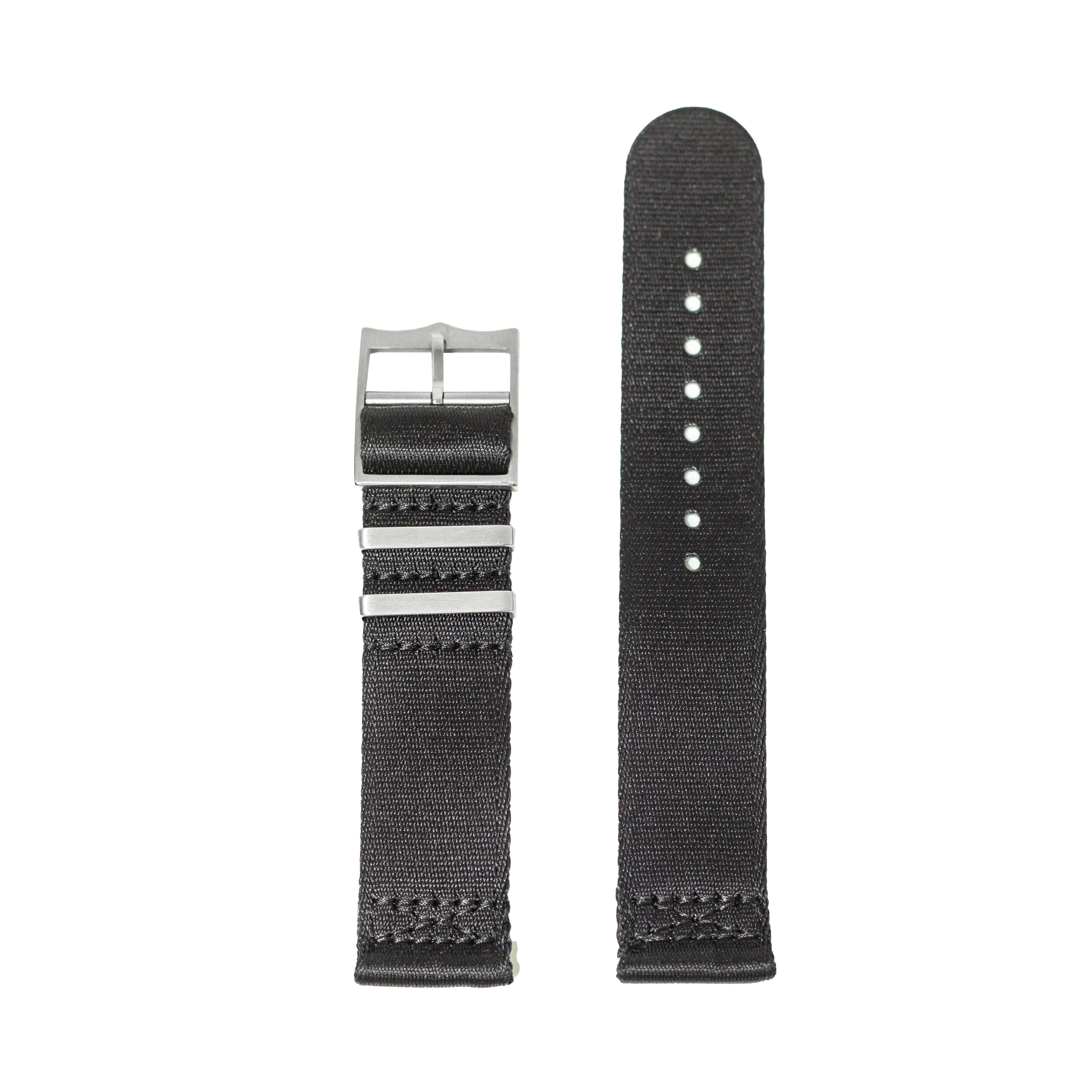 Black nylon quick release watch strap with metal buckle and adjustment holes, front and back view